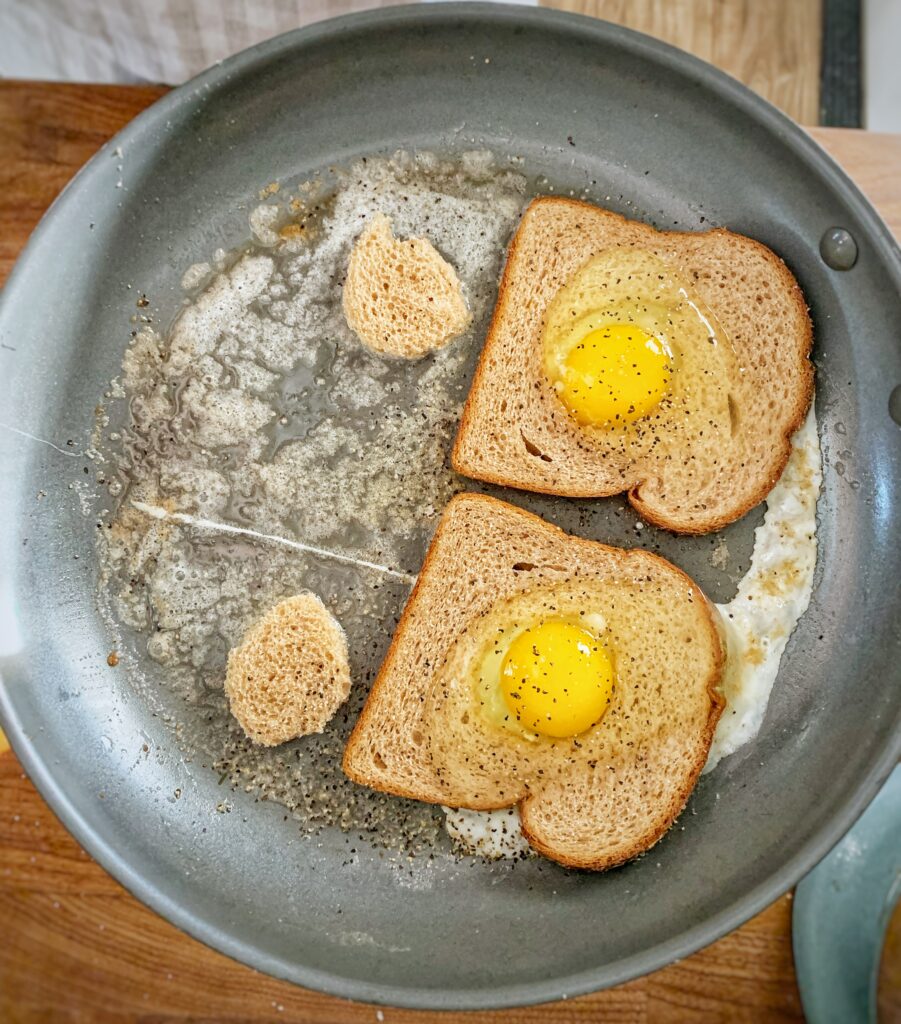 egg in toast in frying pan side number 1