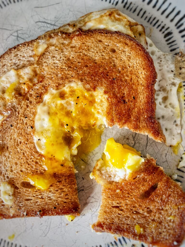 close up egg in toast