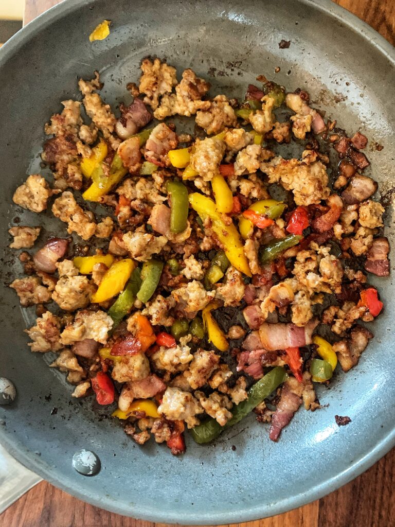 pizza toppings cooked in skillet