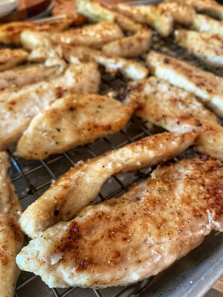 close up of cooked chicken tenders