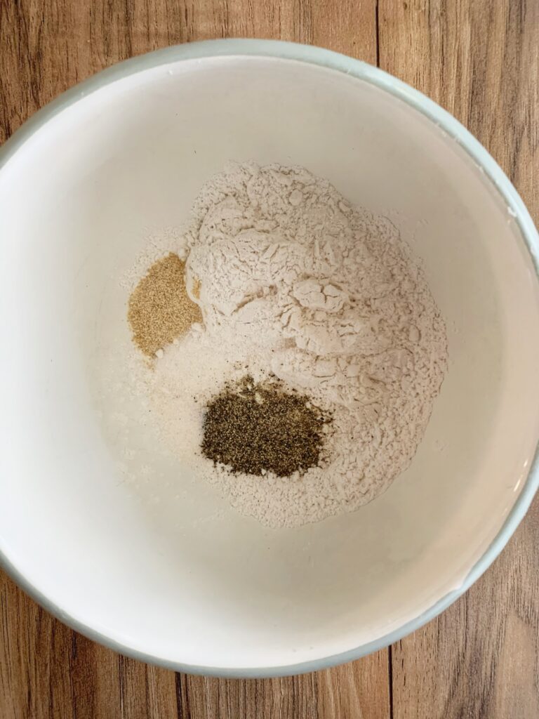 spices and flour in bowl together before they are mixed