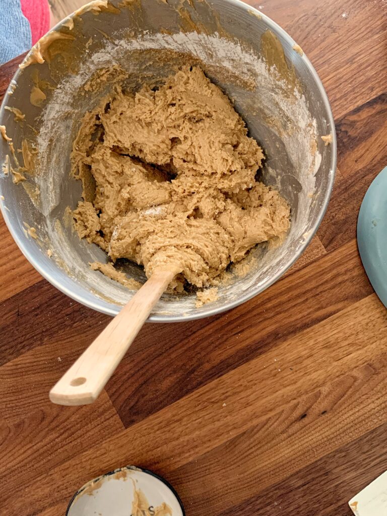 Cookie dough in bowl with spatula