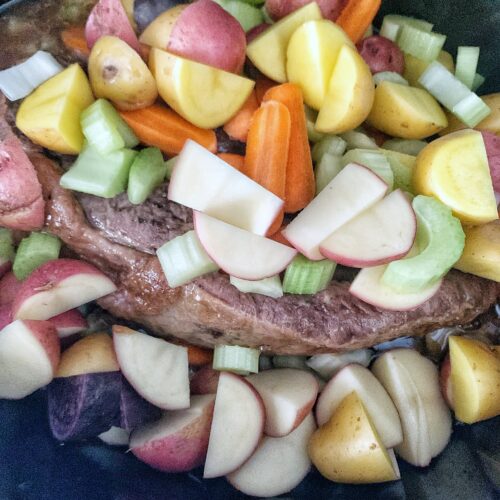 veggies on roast in slow cooker